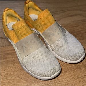 APL Techloom Bliss sneakers women's size 9.5 golden yellow/ white